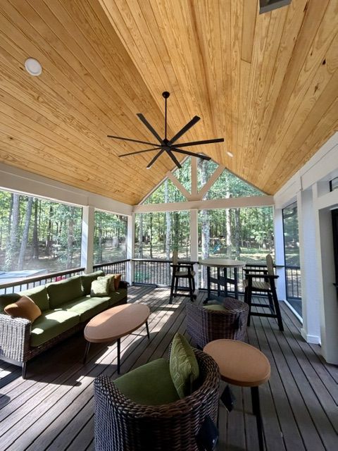 Looking out through the screened porch to the wooded backyard